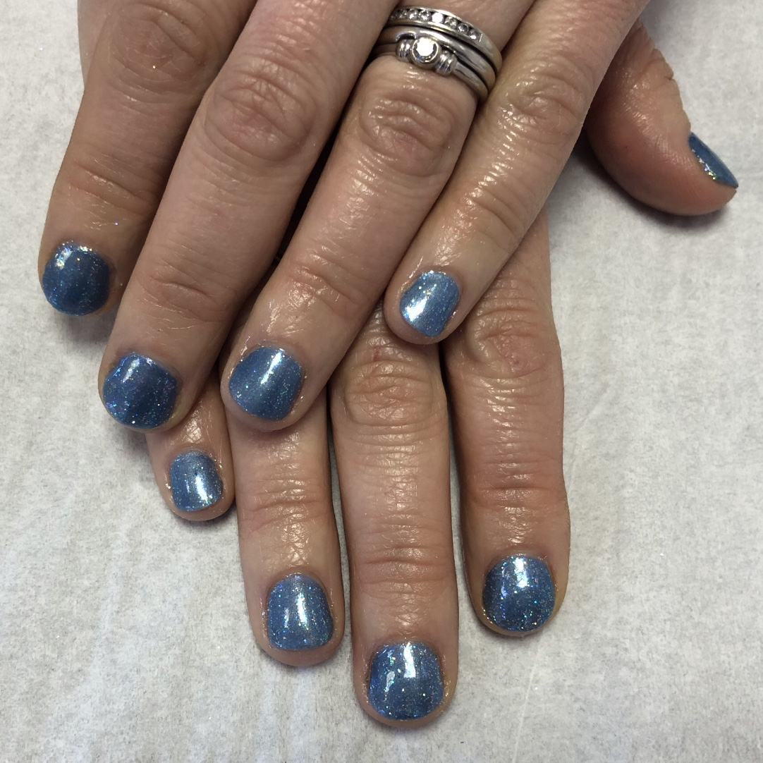 Blue glitter manicure by Elegance
