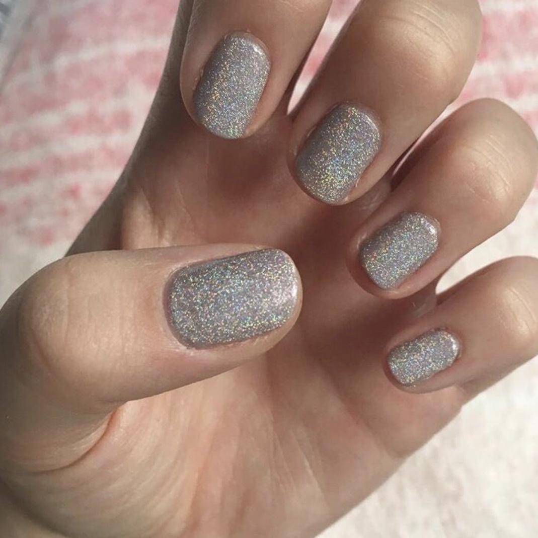 Silver glitter manicure by Elegance